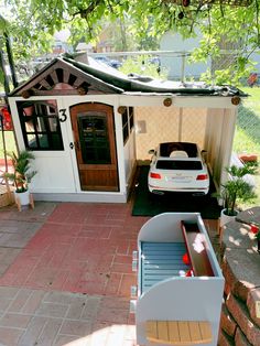 a car parked in front of a small house