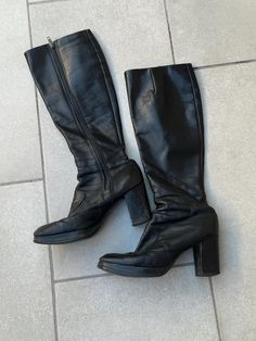 Vintage 70s Black Leather Platform Gogo Boots with Side Zip. Women's Size 6. Metal side zipper on inner side of boots. They are just below knee high length with shaft measuring 15" from top of boot to the top of the heel and 18" total length from top to bottom of boot. 3" wide measurement taken from bottom of sole. Soles look to be in excellent condition. Chunky 3" heel with .75" platform toe. Round toe shape. There are obvious signs of previous wear and age: surface scuffs and wear and a few he Retro Knee-high Fall Boots, Retro Knee-high Heeled Boots For Winter, Retro Knee-high Boots For Fall, Vintage Wide Calf Mid-calf Boots For Winter, Retro Black Heeled Boots For Winter, Retro Black Winter Heeled Boots, Retro Knee-high Winter Boots, Vintage Knee-high Heeled Boots For Winter, Retro Knee-high Leather Boots