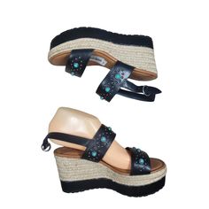 Step Out In Style With These Stunning Black Wedge Espadrilles Sandals From Zodiac. Adorned With Beautiful Turquoise Studs, These Shoes Are Perfect For Adding A Pop Of Color To Any Outfit. The Buckle Closure Ensures A Secure Fit, While The High Heel Gives You An Added Boost Of Confidence. These Sandals Are Made Of High-Quality Leather And Are Brand New Without The Box. The Wedge Heel Style Not Only Adds Height But Also Provides Comfort For Extended Wear. These Shoes Are Perfect For Any Occasion, Turquoise Wedge Heel Sandals For Beach, Black Wedge Sandals For Beach, Spring Season, Espadrilles Sandals, Trendy Black Wedge Sandals With 4-inch Heel, Black Espadrille-style Wedge Sandals With Platform, Modern Black Wedge Sandals With 4-inch Heel, Black Wedge Sandals With 4-inch Heel And Pointed Toe, Cork Wedges Sandals, Platform Wedge Heels