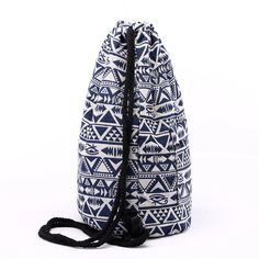 Elevate your everyday style with this Tribal Pattern Canvas Drawstring Backpack. Crafted from durable canvas and featuring a striking boho chic design, this versatile bag is perfect for school, travel, or casual outings. The drawstring closure ensures your belongings are secure while adding a trendy touch to your look. Specs: Material: Polyester Casual Drawstring Shoulder Bag For Travel, Casual Travel Shoulder Bag With Drawstring, Casual Backpack With Adjustable Strap For Beach, Casual Beach Backpack With Adjustable Strap, Casual Beach Backpack, Bohemian Summer Travel Backpack, Casual Vacation Backpack, Casual Travel Bucket Backpack Bag, Casual Drawstring Backpack For Travel