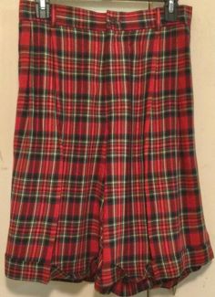 "This is a vintage 1989, woman's size 10, red \"Royal Stewart\" tartan skort made by Ralph Lauren. The \"Thom Browne\", runway-look is in right now and here you can get it without paying the big bucks. It is a full-style item made of 100% rayon. These shorts or skort feature a high-rise waist with belt loops, 4 front pleats, 2 side-seam pockets, rear buttoned pocket, front-zipper & button closure and a 1.5 inch cuffed hemline. The red, Christmas-plaid, fabric is matched perfectly all around. Vintage Knee-length Winter Bottoms, Vintage Knee-length Bottoms For Winter, Christmas Tartan, Womens Skorts, Royal Stewart Tartan, Preppy Christmas, Stewart Tartan, Big Bucks, Christmas Plaid