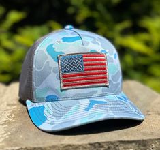 Looking for an awesome patriotic hat in popular duck camo? Check out this new Richardson 112 saltwater duck camo hat and American flag patch combo. The American flag patch is high quality, embroidered and subdued, not designed to replicate the American flag colors perfectly. Five Panel SHAPE Mid-Pro FABRIC Twill/Polyester Mesh VISOR Precurved SWEATBAND Cotton MATERIAL 47% Cotton, 53% Polyester CONSTRUCTION Woven/Knitted FIT & SIZE Adjustable Snapback OSFM (7 - 7 3/4) Tactical Hat, Patriotic Hats, Dream Things, American Flag Patch, Camo Hat, Five Panel, Patch Hat, Camo Hats, Flag Patches