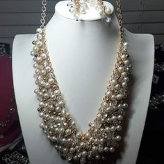 Goldstone Necklace With Pearls Elegant White Metal Jewelry Sets, White Crystal Rhinestone Necklace In Costume Jewelry Style, White Pearl Necklace For Party, White Crystal Rhinestone Costume Jewelry Necklace, White Crystal Rhinestone Costume Necklace, White Pearl Bib Necklaces For Party, White Beaded Crystal Rhinestone Necklace, White Beaded Rhinestone Pearl Necklace, White Pearl Chain Jewelry For Party