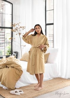 "Linen robe featuring kimono style sleeves made from OEKO tex certified linen fabric. Designed to have a loose fit, can be cinched at the waist with a tie. Absorbent, soft, features pockets and a waist tie, knee-length. Absorbent and fast drying. Please note that due to the many variations in monitors and browsers, actual colors may vary. DETAILS * Model wearing sandy beige in size S is 5\"7\" (170 cm). Questions about the fit? Message us! * Made from 100% European flax * Stone washed for maximu Relaxed Fit Robe With Kimono Sleeves For Loungewear, Loungewear Robe With Relaxed Fit And Kimono Sleeves, Relaxed Fit Kimono For Sleep, Robe With Relaxed Fit And Kimono Sleeves For Daywear, Linen Kimono With Kimono Sleeves For Loungewear, Linen Robe For Daywear, Relaxed Fit Linen Kimono For Daywear, Relaxed Fit Beige Kimono For Loungewear, Beige Relaxed Fit Kimono For Loungewear