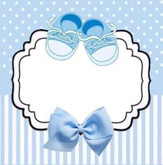 a blue card with baby shoes and a bow on it's side, in front of a striped background