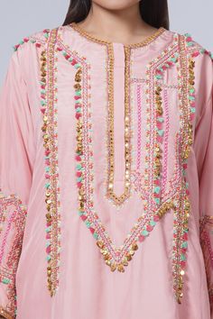 Pink A-line kurta with coin and fringed tassel embroidered bodice and sleeveless. Comes with floral printed pant. - Aza Fashions Festive Straight Kurta Sharara With Tassels, Festive Sharara With Tassels And Straight Kurta, Eid Wedding Sharara With Tassels, Anarkali Wedding Kurta With Tassels, Anarkali Kurta With Tassels For Wedding, Designer Anarkali Sharara With Tassels, Designer Palazzo Set With Tassels For Eid, Designer Tassel Palazzo Set For Eid, Traditional Tassel Palazzo Set For Wedding