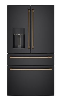 a black refrigerator freezer with gold handles