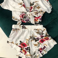 White And Floral Tie Front Top Snd Ruffle Shorts Never Worn! New Without Tags. This Set Is So Cute But Definitely A Bit See Through Tie Front Top, Ruffle Shorts, Front Tie Top, Shorts Set, Floral Tie, Short Sets, So Cute, Color White, Womens Sizes