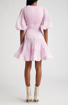 Inspired by snapshots of dance halls from the '50s, this pleated minidress showcases voluminous sleeves and a tiered skirt lifted by a layer of crinoline. 36" length (size 2/8US) Hidden back-zip closure Deep V-neck with button-and-loop closure Elbow-length sleeves with elastic cuffs Lined except sleeves 100% polyester Dry clean Imported Designer Clothing Coral Cocktail Dress, Cotton Tunic Dress, Frill Mini Dress, Designer Clothing Brands, Voluminous Sleeves, Organza Dress, Tiered Midi Dress, Pleated Midi Dress, Silk Mini Dress