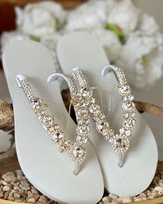 Celebrate the bride-to-be with our sparkling outdoor wedding sandal, a chic custom-made flip flop perfect for bridal shower fashion gifts. This trendy flip flop for bridesmaids is the ideal accessory for the wedding festivities. Say goodbye to ordinary gifts and hello to extraordinary moments with these special finds for your loved ones. **For more gift options take a look at our best seller flip flops https://designbydesirenyc.etsy.com/listing/1304420049 PRODUCT DETAILS  - Rubber flip flop sole Bridal Sandal, Chinese Shoes, Diy Shoe, Crafting Inspiration, Wedding Festivities, Rubber Flip Flops, Extraordinary Moments, Bridal Sandals, Wedding Sandals