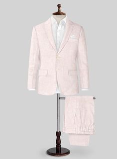 Get ready for summer fun with our Roman Light Pink Linen Boys Suit. Crafted from premium linen, this charming suit is perfect for boys and features a stylish two-button jacket that is both elegant and comfortable. Ideal for any formal event, this suit comes in a delightful light pink color that adds a touch of sophistication. Whether it's a beach wedding, dinner party, or a day out on a yacht, this suit ensures your little one looks his best while feeling great.  Look Includes    Roman     Light     Pink     Linen  Fabric  Two Button Jacket Style  Notch Lapel    Corozo   Beige  Buttons  Single Vent  Three Cuff Buttons  Two Welted Back Pockets on Trousers    Click 'Customize Now' to modify the look if needed.   Lining: Viscose; Dry Clean. Beach Wedding Dinner, Pink Linen Fabric, Wedding Dinner Party, On A Yacht, Italian Suit, A Yacht, Get Ready For Summer, Button Jacket