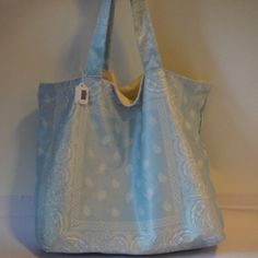 *Nwt Womens Tina Demel Boutique Light Blue, White Paisley Soft Bandana Tote Bag No Closure Retail: $98 Material: Fabric Measurements: Height: 15" Width: 21" Depth: 7" Strap Drop: 10" Nwt, New With Tags. ..Tin-Ros-1** Reversible Blue Shoulder Bag For Beach, Reversible Blue Shoulder Bag For The Beach, Light Blue Cotton Bags For Everyday Use, Light Blue Cotton Bag For Everyday Use, Casual Blue Fabric Shoulder Bag, Blue Summer Hobo Tote Bag, Summer Blue Hobo Bag, Summer Blue Hobo Bag For Everyday, Blue Reversible Hobo Bag For Travel