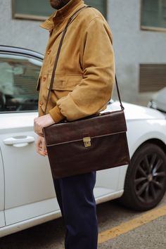 Our company's artisans combine old world craft methods with modern function, thus creating a non-bulky European design that's perfect for today's professional on the go. The rich character of these luxury products will age beautifully and develop into a better version than when first purchased. Briefcases for men are more than an accessory. A leather briefcase bag is an extension of who you are and what you believe in. When we craft leather briefcase bags for men, they are designed to securely h Brown Business Case, Brown Satchel Bag For Business Meetings, Brown Leather Briefcase For Daily Use, Brown Leather Satchel For Business Meetings, Brown Rectangular Laptop Bag, Brown Satchel Briefcase With Interior Card Slots, Brown Leather Bags For Business Meetings, Formal Brown Briefcase With Waxed Finish, Brown Satchel Briefcase For Business Meetings