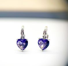 Sweet heart earrings! Deep purple amethyst heart shaped Cubic Zirconia gemstone! 3 prong setting 5mmx6mm size Drop length 15mm February birthstone Perfect gift for someone you love!  Thanks for looking make sure to check out my store for other unique gift ideas! https://www.etsy.com/ca/shop/PersonalizedByLD Lisa Petite Jewelry, Amethyst Heart, Heart Drop Earrings, February Birthstone, Sweet Heart, February Birth Stone, Favorite Rings, Purple Amethyst, Heart Earrings