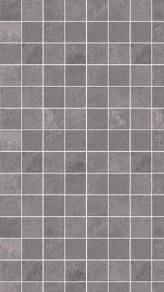 a tile wall with grey and white squares on it's sides, as well as an orange border