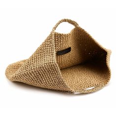 Ideal for running such errands and doubling up as a beach tote, this large tote is handwoven from paper rope and trimmed with smooth beige leather. This timeless bag has enough space for your daily essentials. 100% paper rope Open top Height: 16"/32cm Width: 17"/44cm Comes with a dust bag Handmade in Turkey Eco-friendly Crochet Bag With Woven Leather Details, Eco-friendly Crochet Jute Bag With Woven Leather, Eco-friendly Jute Crochet Bag With Woven Leather, Beige Crochet Bag With Woven Leather, Eco-friendly Woven Leather Beach Bag, Eco-friendly Woven Leather Crochet Bag For Daily Use, Eco-friendly Beige Woven Leather Beach Bag, Everyday Beige Crochet Bag With Woven Leather, Beige Crochet Bag With Woven Leather For Everyday