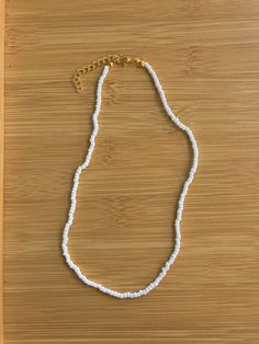 white seed bead necklace. age size, 9yrs - 24yrs. waterproof beaded necklace handmade with love by Addi. Handmade Adjustable White Beads, Everyday White Single Strand Beaded Necklace, Adjustable Single Strand White Jewelry, Everyday White Beaded Necklaces, Adjustable White Single Strand Jewelry, White Adjustable Single Strand Jewelry, Everyday Adjustable White Necklaces, Everyday Adjustable White Necklace, White Beaded Necklaces With Tiny Beads For Everyday