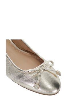 A delicate bow tops the rounded toe of a ballerina-style pump set on a low heel. Leather upper/synthetic lining/rubber sole Imported Chic Party Ballet Flats With Removable Insole, Formal Flats With Padded Heel, Party Ballet Flats With Bow, Party Ballet Flats With Bow And Round Toe, Party Bow Round Toe Ballet Flats, Round Toe Ballet Flats With Bow For Party, Elegant Closed Toe Ballet Flats For Formal Occasions, Elegant Flats With Bow And Round Toe, Formal Closed Toe Ballet Flats