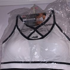 Ava Brand Seamless Sports Bra. New With Tags. White Sports Bra With Built-in Padding, White Sporty Activewear With Built-in Padding, Sporty White Activewear With Built-in Padding, White Compression Sports Bra With Medium Support, White Compression Sports Bra With Go-dry, White Stretch Activewear, White Stretch Tops With Built-in Padding, White Activewear With Built-in Padding For Gym, White Compression Racerback Activewear