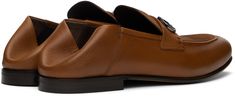 Buffed calfskin loafers in brown. · Almond moc toe · Logo hardware at vamp · Collapsible heel counter · Buffed leather and suede lining · Stacked leather heel with rubber injection · Leather sole Supplier color: Mogensen brown Luxury Leather Tassel Loafers For Semi-formal Occasions, Luxury Brown Tassel Loafers For Business, Luxury Cognac Loafers With Leather Lining, Luxury Cognac Loafers For Business, Luxury Leather Tassel Loafers For Business Casual, Luxury Leather Tassel Loafers With Leather Lining, Formal Cognac Leather Loafers, Cognac Leather Moc Toe Loafers, Calf Leather Moc Toe Tassel Loafers For Office