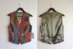 "Vintage 90s patchwork suede leather vest with intricate seamwork in a brown, red, beige, rust, blue and dark green combo. The colorful patches of suede are matched perfectly with zig zag stitches all around. Features two small pockets, notched hem and adjustable pull tab in back. Great for layering! Perfect for layering over a flowy peasant top or tight turtleneck. Styled on a modern size 36. Condition: New with tag Material: 100% Suede, Lining: 100% Polyester Tag size: Women's size EUR S/ 36. Retro Patchwork Vest For Fall, Fitted Multicolor Patchwork Vest, Multicolor Patchwork Fitted Vest, Fitted Patchwork Vest For Spring, Fitted Sleeveless Patchwork Vest, Fitted Multicolor Vest For Fall, Fitted Patchwork Vest For Fall, Brown Patchwork Vest For Fall, Patchwork Quilt Jacket