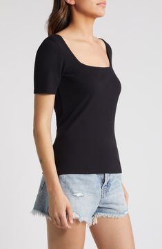 Solid and stretchy, this ribbed top will achieve staple status as you wear it year-round. 23 1/2" length (size Medium) Scoop neck Short sleeves 55% cotton, 40% modal, 5% spandex Machine wash, dry flat Imported Seamless Tops For Everyday Spring Wear, Black Ribbed Elastane Tops, Chic Everyday Seamless Top, Chic Ribbed Cotton Top, Chic Ribbed Knit Top With Square Neck, Stretch Ribbed Knit Top For Everyday, Spring Ribbed Elastane Tops, Black Square Neck Top In Elastane, Spring Ribbed Knit Top For Everyday