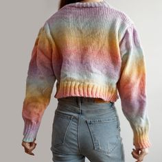 Cable knit cardigan in a cropped fit with striped pastel rainbow colors. Fits S-M 16" across shoulders 35" chest 13" length Multicolor Cropped Sweater For Spring, Multicolor Cropped Winter Sweater, Spring Multicolor Cropped Sweater, Multicolor Knit Cropped Sweater For Spring, Multicolor Cropped Sweater For Winter, Casual Multicolor Cropped Sweater, Trendy Multicolor Cropped Sweater For Spring, Trendy Rainbow Knit Sweater, Pastel Rainbow Colors