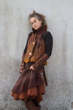 Earthy brown felt waistcoat Woodland pixie Nuno felt vest | Etsy Brown Wool Vest For Winter, Bohemian Fall Vest Outerwear, Bohemian Vest Outerwear For Fall, Brown Wool Vest For Fall, Winter Festival Outerwear Vest, Bohemian Brown Vest For Fall, Winter Bohemian Brown Vest, Brown Bohemian Winter Vest, Bohemian Brown Winter Vest