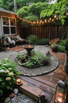 Cozy backyard garden with string lights, a fire pit, and outdoor seating. Surrounded by lush greenery and potted plants, creating a relaxing atmosphere. Outdoor Napping Area, Multipurpose Outdoor Space, Small Backyard Sitting Area Ideas, Small Cozy Garden, Green Backyard Ideas, Cozy Yard Ideas, Mobile Home Backyard Ideas, Flat Backyard Landscaping Ideas, Rental Friendly Backyard Ideas