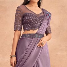 Mauve colored stitched saree is made from art silk fabric which is highlighted with sequins embroidered work as shown. comes along with sequins embroidered soft net blouse piece which you can customise as per your design/style. Occasion - You can wear this saree for parties, functions and events. Note:- the actual product may differ slightly in color and design from the one illustrated in the images when compared with computer or mobile screen. Net Blouse, Stitched Saree, Net Blouses, Art Silk Sarees, Mobile Screen, Blouse Piece, Surprise Gifts, Design Style, Silk Fabric