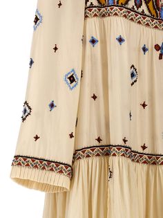 'Arsia' cotton dress with embroidery and beading embellishment, tiered skirt, crew neck with adjustable drawstring, long sleeves. Composition: 100% cotton Beading Embellishment, Dress With Embroidery, Flounce Skirt, Classic Trousers, Tier Skirt, Tiered Skirt, Yoga Wear, Bridal Shoes, Dress Codes