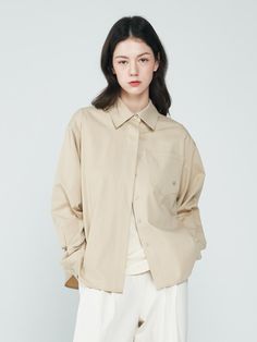 Composition : COTTON 100%Country of Origin : Republic of Korea Beige Cotton Shirt For Business Casual, Beige Shirt With Pockets For Fall, Beige Blouse For Business Casual In Fall, Fall Business Casual Beige Blouse, Beige Button-up Top For Everyday, Neutral Button-up Tops For Everyday, Oversized Cream Long Sleeve Shirt, Everyday Khaki Shirt For Fall, Everyday Khaki Fall Shirt