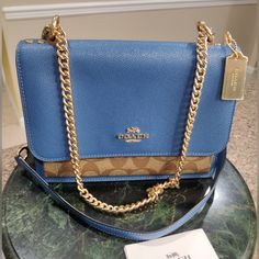 Nwot Shoulder Or Cross Body Luxury Blue Bag With Chain Detail, Luxury Blue Bags With Chain Detail, Luxury Blue Bags With Chain, Luxury Blue Chain Bags, Designer Blue Bag With Chain Strap, Formal Blue Shoulder Bag With Chain Strap, Formal Blue Bag With Chain, Blue Evening Bag With Chain Detail, Coach Brown Shoulder Bag With Chain Strap