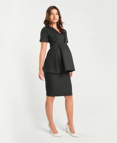 Can you think of any garment that makes a woman look more effortlessly polished than a gorgeous, well-made maternity pencil skirt? The tailored, over-belly Elizabeth Maternity Pencil Skirt will keep you looking boardroom ready through all stages of maternity. Its elevated, Italian designed stretch material combines the power of a suit with the comfort of your favorite leggings. Its soft and strong over-belly stretch material will cradle your bump and support your back through any meeting - no ma Chic Fitted Short Sleeve Maternity Dress, Chic Fitted Maternity Dress With Short Sleeves, Chic Fitted Knee-length Maternity Dress, Chic Fitted Maternity Dress, Black Lined Skirt Dress For Work, Fitted Workwear Dress With Lined Skirt, Chic Office Dress With Relaxed Skirt, Maternity Office Wear, Maternity Pencil Skirt