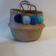 Nwt Womens Eliza Gran Natural Woven Basket Bag Pom Pom Venice Tote Handbag Color: Natural, Blue Shades Open/No Closure 1- Main Compartment Double Handles Pom Pom Accents Materials: Basket Measurements: Depth: 5.3" Height: 11.5" Width: 11.5" Handle Drop: 4.7" Nwt, New With Tag. ...Mels_ktchr_children577-4** Woven Basket, Basket Bag, Tote Handbag, Womens Tote Bags, Tote Handbags, Venice, Pom Pom, Handles, Shades