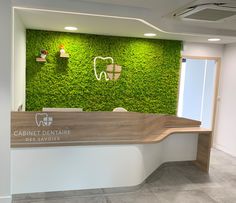 a dental office with moss growing on the wall