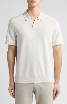 This work-to-weekend polo is crafted in a soft shape-retaining knit for season-spanning polish. 26 1/2" length ( size Medium) Button half-placket Short sleeves 60% viscose, 36% thermoplastic polyester, 4% other fibers Machine wash, dry flat Imported Cream Cotton Polo Shirt With Ribbed Collar, Cream Cotton Polo Shirt, Casual Beige Polo Shirt With Button Closure, Beige Short Sleeve Casual Polo Sweater, Casual Beige Short Sleeve Polo Sweater, Classic Cream Polo Shirt With Collared Neckline, Casual Cream Polo Shirt With Ribbed Collar, Classic Beige Polo Shirt, Classic Knit Polo Sweater With Short Sleeves