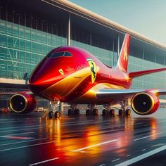 a red and gold airplane is on the runway