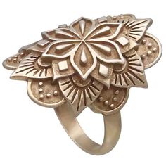 The way this bronze large mandala ring wraps over the finger is simply stunning. It feels dramatic and lush. Composed of six petals and four layers, this mandala ring is blooming with beauty and symbolism. The six petalled blossom at the center represents our transformative nature as we make our way through any process - moving through grief and healing, or becoming artists, poets, and our best selves. The second circle of diamonds can be seen as indestructability. The act of becoming requires w Bohemian Copper Rings, Bohemian Rose Gold Ring Jewelry, Bohemian Rose Gold Brass Jewelry, Adjustable Bohemian Flower Ring, Bohemian Flower Ring With Intricate Design, Bohemian Flower Ring With Intricate Design For Gift, Bohemian Jewelry With Intricate Flower Design, Bohemian Flower Jewelry With Intricate Design, Travel Charms