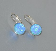 "Shop Leverback Earrings, Blue Opal Earrings Sterling Silver, Opal Jewelry Looking for opal jewelry? Opal is October birthstone. Shop Lever Back Earrings, Opal Earrings Sterling Silver, October Birthstone, 8mm Stone, Beaded Bridal Opal Jewelry. Opal earrings will bring a perfect touch of flair and splash of magnificent color to your outfit! Arrays of different colors are captured in beautiful opal cabochons. They look very mysterious. Lever back earrings are very light and comfortable. It will m Silver Opal Earrings For Anniversary, Elegant Silver Opal Earrings, Hypoallergenic Opal Dangle Earrings, Hypoallergenic Opal Dangle Jewelry, Hypoallergenic Round Opal Jewelry, Anniversary Silver Opal Earrings, Opal Drop Earrings As A Gift, Opal Ear Wire Earrings For Gift, Opal Dangle Earrings For Gift