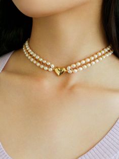 Classic Love Choker - 18K gold plated, lustrous freshwater pearl, adjustable, lightweight, perfect for any look, whether it's a special event or your everyday wardrobe. Crafted from precision, high-quality materials, this choker exudes timeless elegance and sophistication. Elevate your style with Love Choker vintage double strand pearls. Metal: 18K Recycled Gold Plated On Brass Gemstone: Freshwater Pearl Pearl Dimensions: 4.5-5.5mm Necklace Length: 330-420mm Weight: 34.5g Gold Pearl Choker With Clavicle Chain, Gold Pearl Clavicle Chain Choker, Valentine's Day Party Pearl Necklace, Gold Pearl Choker With Adjustable Chain, Adjustable Gold Choker With Pearl Drop, Classic Gold Pearl Choker, Gold Kundan Pearl Choker Necklace, Elegant Clavicle Chain Choker For Valentine's Day, Gold Pearl Necklace For Wedding And Valentine's Day