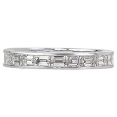 Handcrafted in 18k white gold, this elegant diamond eternity band features 2.10ct of baguette cut diamonds graded at E-F, VS1-VS2. All eternity bands are shown in a size 6.5. We custom craft each eternity band and will create the same design for you in your desired ring size. Please contact us with any questions. Thank you. Luxury Baguette Cut White Eternity Band, Baguette Cut Eternity Band With Diamond Accents, Memory Ring, Mark Broumand, Diamond Eternity Band, Baguette Cut Diamond, Eternity Band Diamond, Diamond Eternity, Baguette Cut