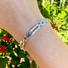 This bracelet features a striking modern, geometric design with alternating square and rectangle links. With a perfect balance of modern style and timeless elegance, this piece is both eye-catching and versatile. It's a unique addition to any jewelry collection, ideal for those who appreciate clean lines and contemporary design. Length: Available in 7" or 8" Material: Solid 925 Italian Sterling Silver Clasp Type: Lobster Clasp Bracelet Luxury, Style Moderne, Chain Link Bracelet, Link Chain, Artisan Jewelry, Geometric Design, Chain Link, Contemporary Design, Timeless Elegance