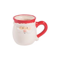 a red and white mug with a santa clause on it's face is sitting in front of a white background