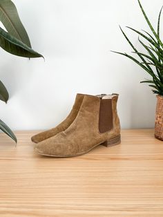 "Vintagen Y2K brown suede chelsea boots.  Label: Zara Fits Like: marked 39, fit like womens 8.5 US  Color: brown Fabrication:  Condition: good vintage condition, normal signs of wear 10.5\" length 3.25\" ball of boot 1\" heel height 5.5\" height This item comes from a pet & smoke free building. For a look behind the scenes at our treasure hunting trips follow us at: + Instagram: @mostlymagicvintage + TikTok: @mostlymagik" Brown Suede-lined Chelsea Ankle Boots, Brown Chelsea Ankle Boots With Suede Lining, Brown Suede Chelsea Boots For Fall, Brown Suede Ankle-high Chelsea Boots, Ankle-high Brown Suede Chelsea Boots, Brown Suede Chelsea Boots With Pointed Toe, Vintage Suede Ankle-high Boots, Vintage Ankle-high Suede Boots, Zara Fits