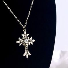 This silver gothic cross necklace embodies grunge jewelry aesthetics with its cross pendant, making it a meaningful religious gift for your Catholic friend or her, perfect for women who adore minimalist jewelry and seek unique gift ideas. 𝐃𝐄𝐓𝐀𝐈𝐋𝐒: ⭐️ Necklace Lengths available are 14" 16" 18" 20" ⭐️ Cross charm size is 2" ⭐️ The Silver cross charm is silver plated over metal & cable necklace chain includes high-quality stainless-steel which are made hypoallergenic and are safe for those w Metal Crucifix Cross Necklace Gift, Metal Crucifix Cross Necklace As Gift, Metal Crucifix Cross Necklace For Gift, Gothic Cross Jewelry As Gift, Gothic Cross Jewelry For Gifts, Gothic Cross Jewelry Gift, Silver Spiritual Cross Necklace With Clavicle Chain, Silver Cross Necklace With Clavicle Chain, Spiritual Metal Cross Necklace