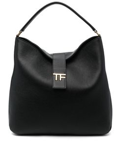 logo-plaque leather tote bag from TOM FORD featuring black, calf leather, grained texture, gold-tone logo plaque, logo stamp to the rear, strap and press-stud fastening, single flat top handle, internal slip pocket and main compartment. Size Info UNI Color Detail Black Made In Italy Material Outer: Calf leather 100% Lining: Polyamide 60% Polyurethane 40% Season One Fall-Winter Season Two Fall-Winter Product bags.. Brand Tom Ford Size And Fit Width 15,75 in / 40 cm Height 14,96 in / 38 cm Depth 3 Luxury Logo Tote Shoulder Bag, Luxury Logo Satchel For Everyday, Formal Double Handle Bag With Logo, Luxury Satchel Shoulder Bag With Logo, Luxury Logo Satchel Shoulder Bag, Formal Satchel Bag With Logo, Timeless Formal Bags With Metal Logo, Classic Tan Bags With Logo, Rectangular Leather Satchel With Logo