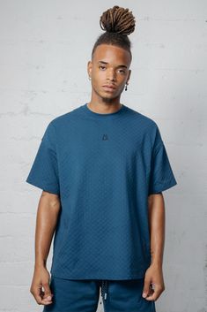 This boxy tee is crafted from jacquard checkered fabric, giving it a unique and stylish look. With a back yoke design, this tee offers a comfortable and flattering fit for any occasion. 96% Cotton 4% Spandex Models are 6'2" and wearing a size medium Oversized Jacquard Knit Crew Neck Top, Casual Jacquard Knit Tops For Streetwear, Relaxed Fit Textured Crew Neck Top, Textured Relaxed Fit Crew Neck Top, Cotton Jacquard Knit Short Sleeve Tops, Casual Jacquard Knit Top With Relaxed Fit, Back Yoke Design, Yoke Design, Checkered Fabric