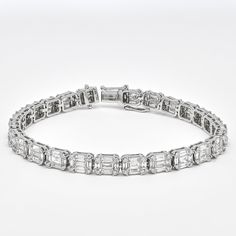 Make sparkle a priority with this glamorous diamond tennis bracelet. Fabulous and dramatic, this dazzling round-shape and baguette diamond Bracelet is a perfect accent to everyday and evening looks. Artfully set in 18k white gold, this exquisite bracelet features the soft shimmer of diamond baguette gorgeously enhanced by round-shape diamond in a cluster setting. Metal: 18kt White Gold Weight:14.52 Grams Gemstone: Natural Diamonds Shape: Round Brilliant/ Baguette Total Carat Weight: 5.88CT Avera Luxury Diamond Jewelry, Diamond Baguette, Cluster Bracelets, Diamond Tennis Bracelet, Wedding Jewelry Bracelets, Tennis Bracelet Diamond, Baguette Diamond, Diamond Cluster, Wedding Bracelet