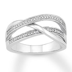 a white gold ring with diamonds on it